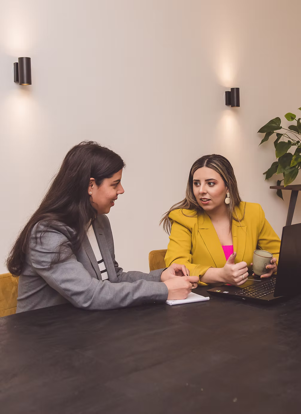 Two Eureka Creates strategists working through a client session together